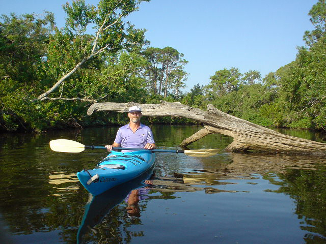 Mr. Bill in front of the dead-tree entrance to the 'round-the-island' route